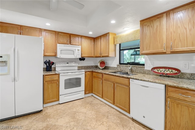 kitchen featuring white appliances, sink, tasteful backsplash, ceiling fan, and light tile floors