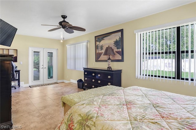 bedroom featuring access to exterior, a ceiling fan, baseboards, tile patterned flooring, and french doors