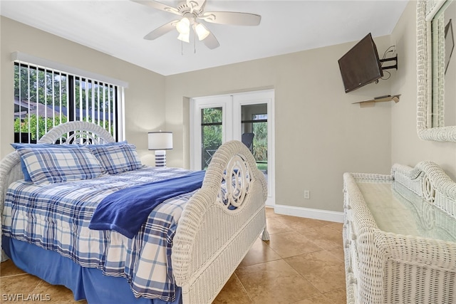 tiled bedroom with ceiling fan