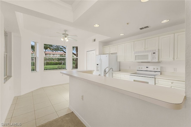 kitchen with white appliances, white cabinetry, sink, ceiling fan, and light tile patterned flooring