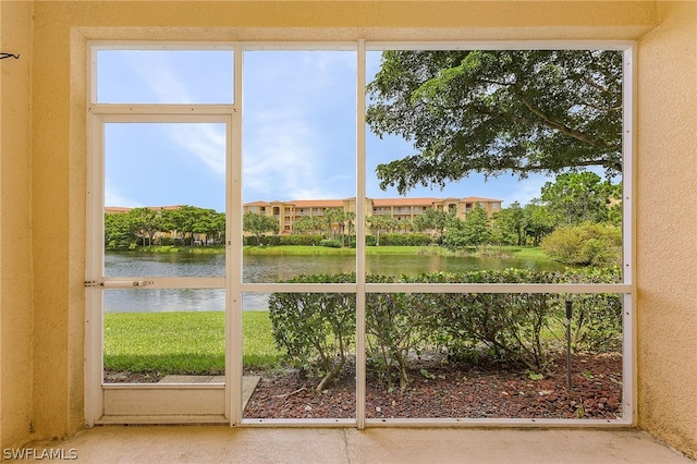 doorway featuring a water view