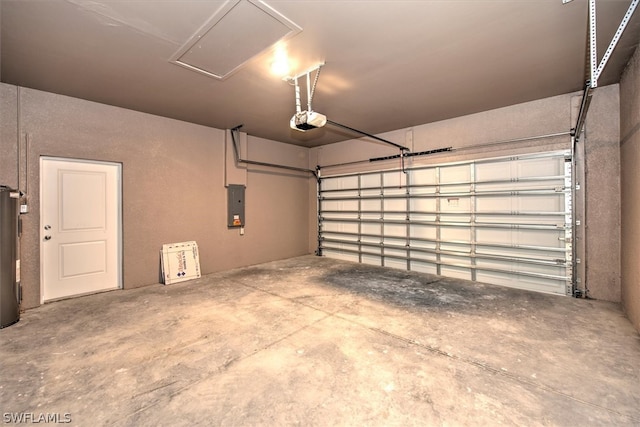 garage featuring electric panel, a garage door opener, and water heater