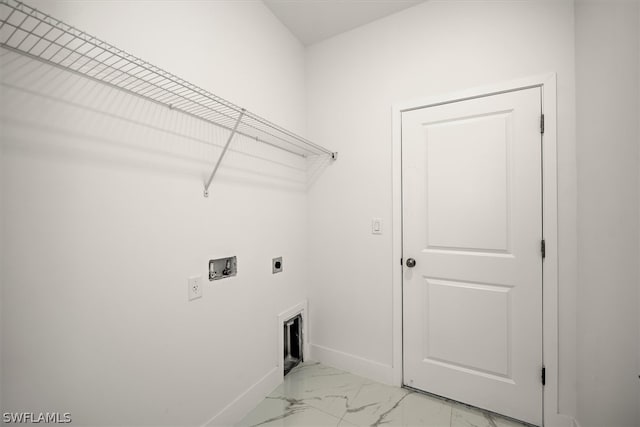 clothes washing area with washer hookup and hookup for an electric dryer