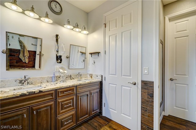 bathroom featuring vanity and hardwood / wood-style flooring