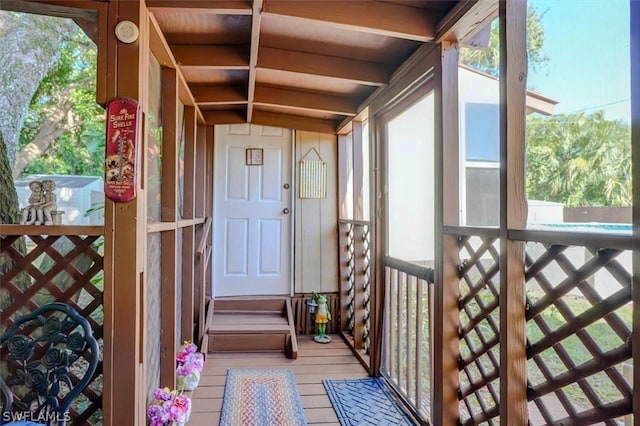 property entrance with covered porch