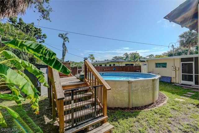 exterior space with a yard and a wooden deck