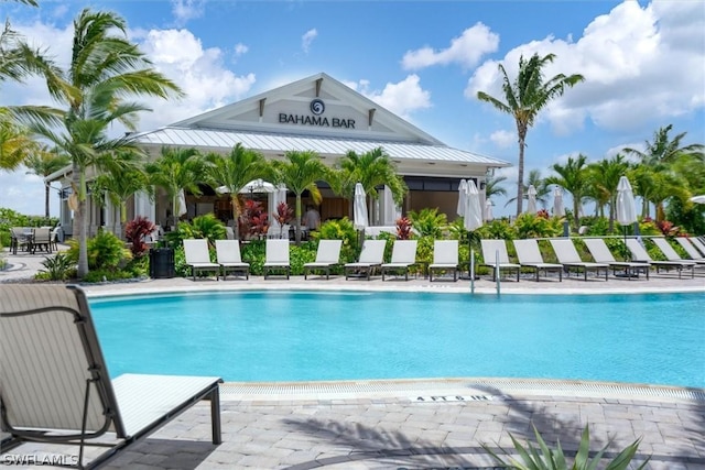 view of swimming pool with a patio area