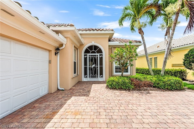 entrance to property with a garage