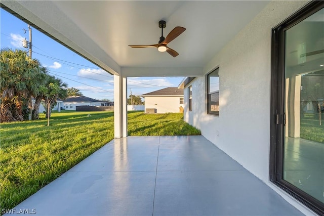 view of patio with ceiling fan