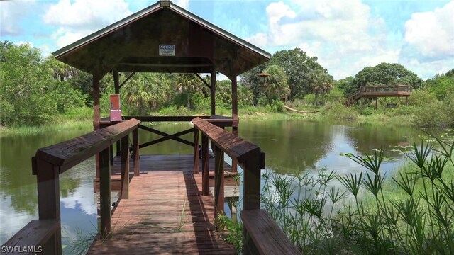 view of dock with a water view