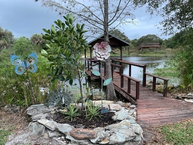 view of dock with a water view