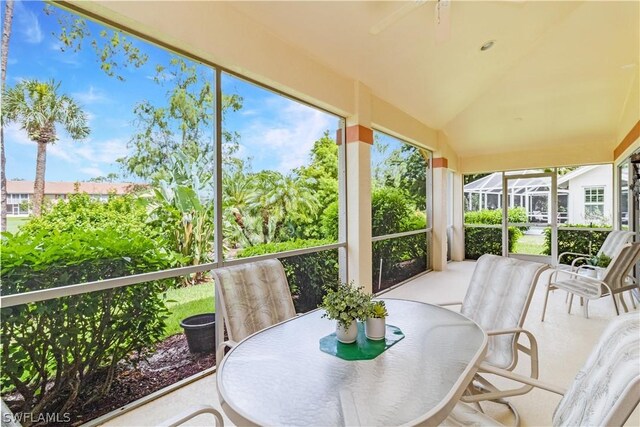 sunroom with lofted ceiling