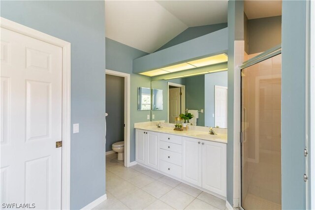 bathroom featuring toilet, an enclosed shower, tile patterned flooring, vanity, and lofted ceiling