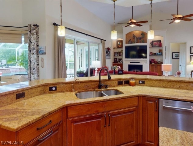 kitchen with dishwasher, sink, plenty of natural light, and ceiling fan