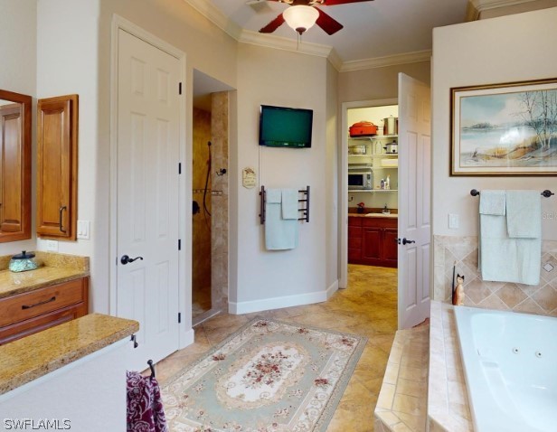 bathroom featuring tile flooring, ornamental molding, separate shower and tub, and ceiling fan