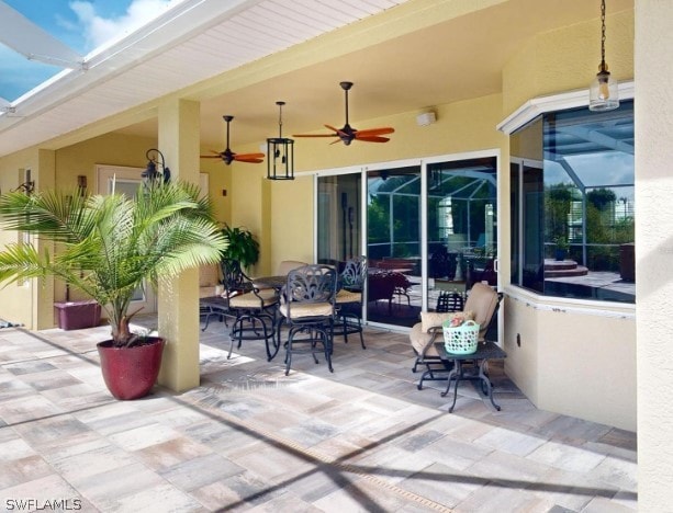 view of patio / terrace featuring ceiling fan