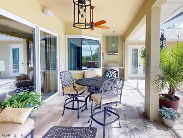 view of patio with ceiling fan