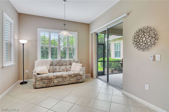 sitting room featuring light tile patterned floors