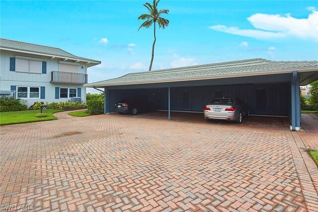 view of parking / parking lot with a carport