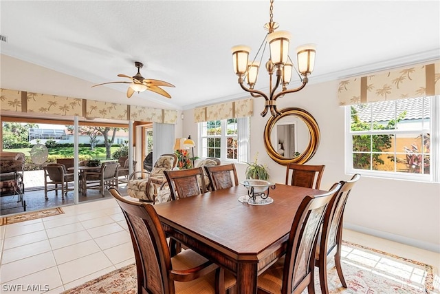 dining space featuring ceiling fan with notable chandelier, light tile patterned floors, and ornamental molding