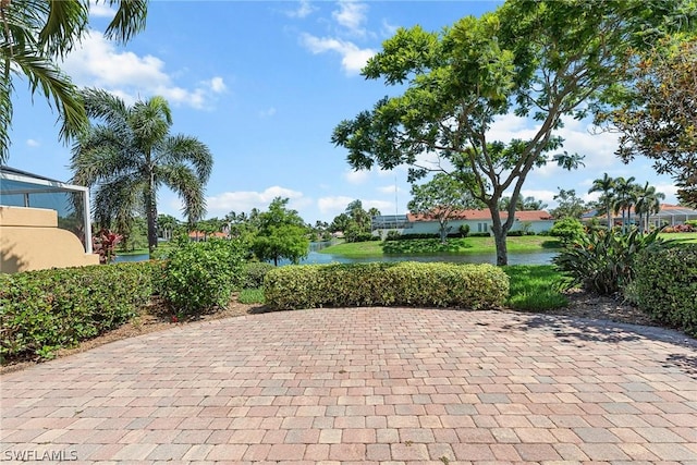 view of patio featuring a water view