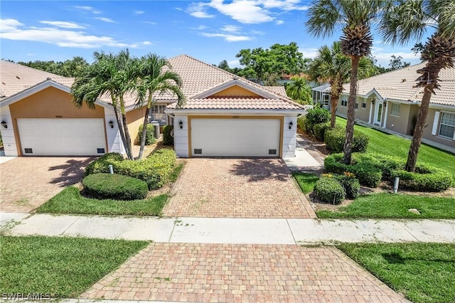 view of front of house with a garage