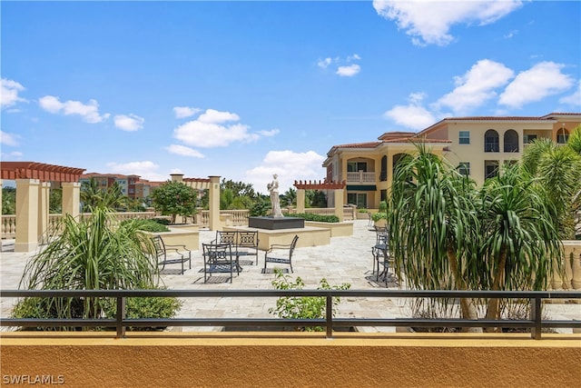 surrounding community featuring a patio area