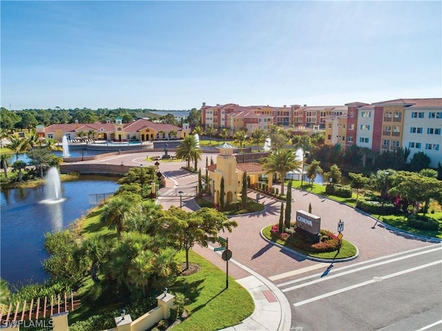 view of home's community with a water view