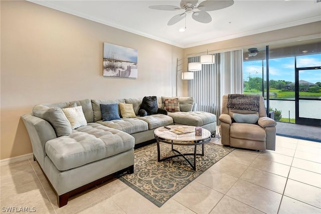 tiled living room featuring a water view, ceiling fan, and crown molding