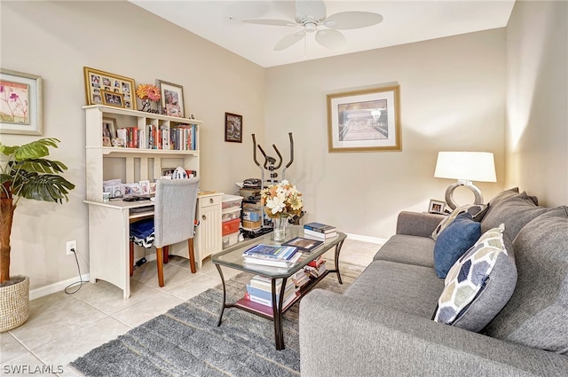 tiled living room with ceiling fan