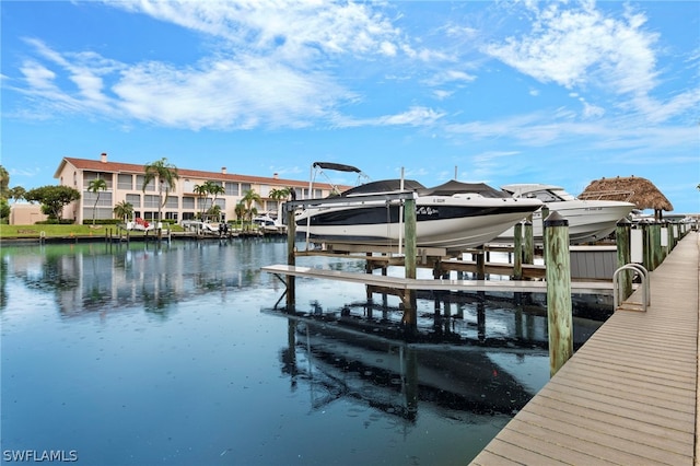 dock area featuring a water view