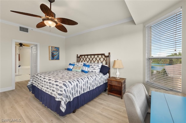 bedroom with ensuite bathroom, ceiling fan, and ornamental molding