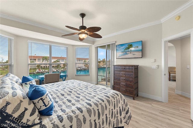 bedroom with access to outside, light hardwood / wood-style flooring, ceiling fan, and ornamental molding