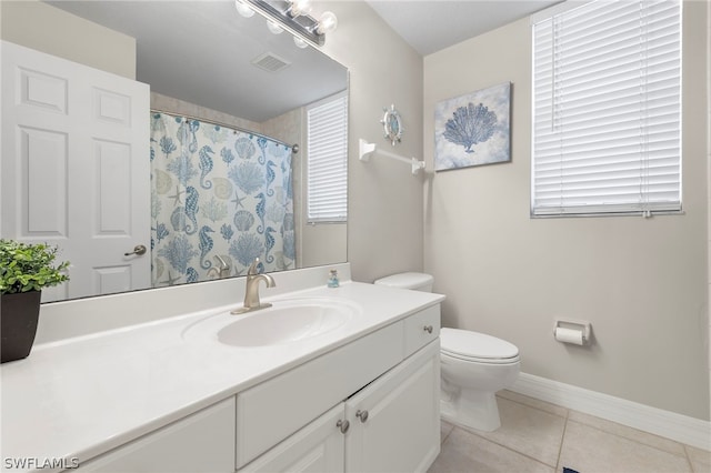 bathroom featuring tile patterned flooring, vanity, toilet, and a shower with curtain