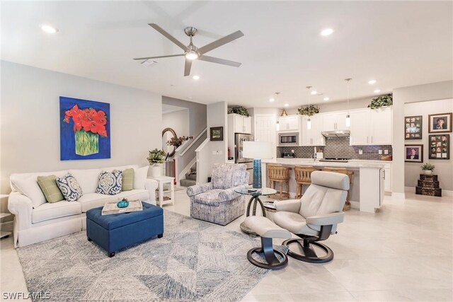 living room with ceiling fan