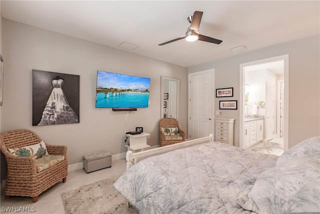 bedroom with ceiling fan and ensuite bathroom