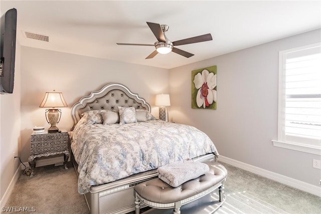 bedroom featuring ceiling fan and carpet flooring