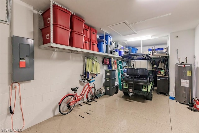 garage featuring water heater and electric panel