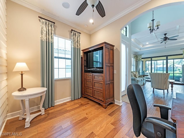 office area featuring light hardwood / wood-style floors, ceiling fan with notable chandelier, and ornamental molding