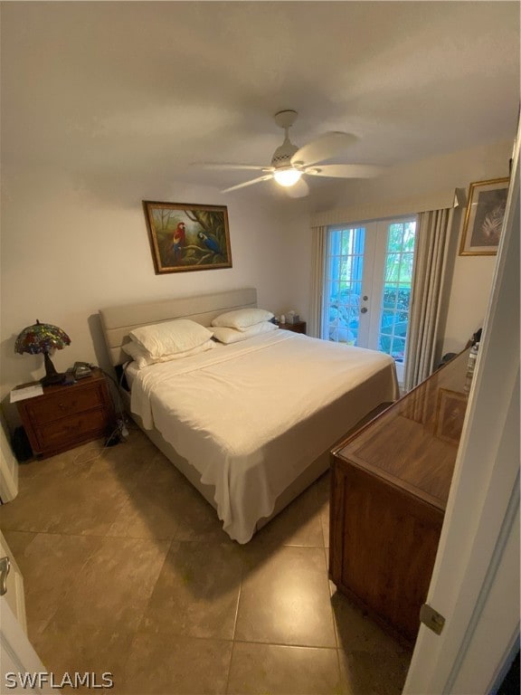 bedroom featuring french doors, light tile flooring, ceiling fan, and access to exterior