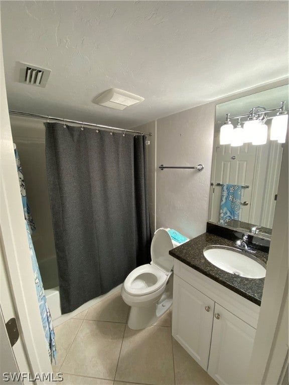 full bathroom with shower / bathtub combination with curtain, vanity with extensive cabinet space, tile flooring, and toilet