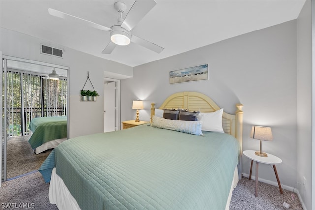 bedroom featuring dark colored carpet, ceiling fan, and access to exterior