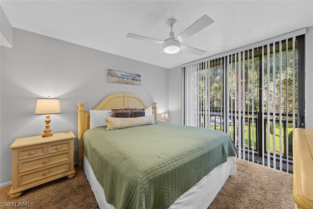 carpeted bedroom with ceiling fan and access to outside