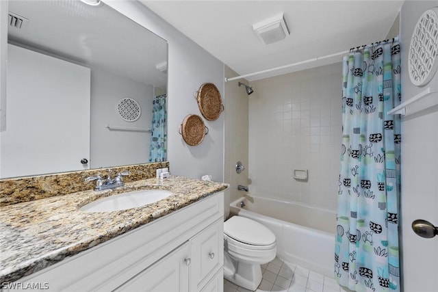 full bathroom with visible vents, toilet, shower / bath combo, vanity, and tile patterned flooring