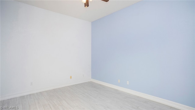 unfurnished room with ceiling fan and light wood-type flooring