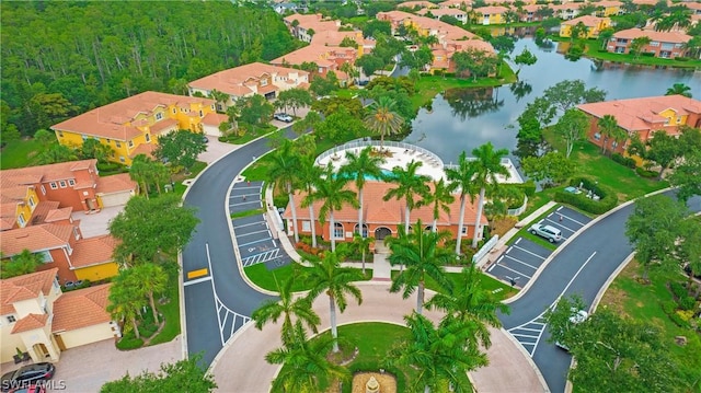 aerial view featuring a residential view and a water view