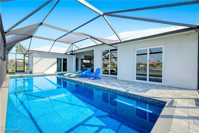 view of pool featuring a lanai and a patio area