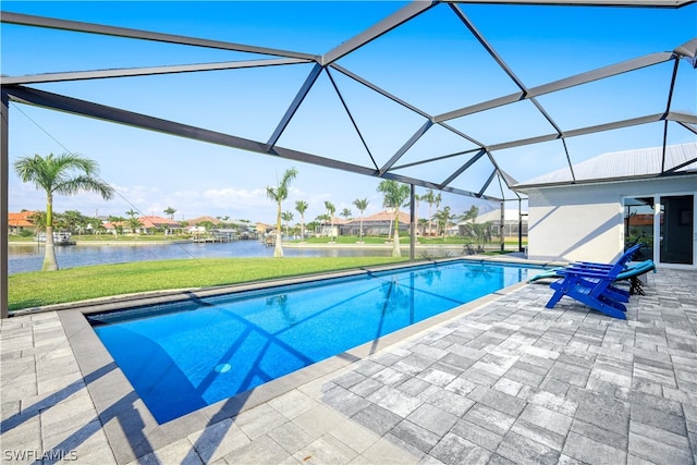 view of pool featuring a patio area, a lanai, and a water view