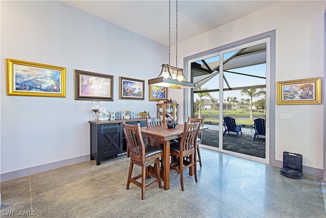 dining room with concrete floors