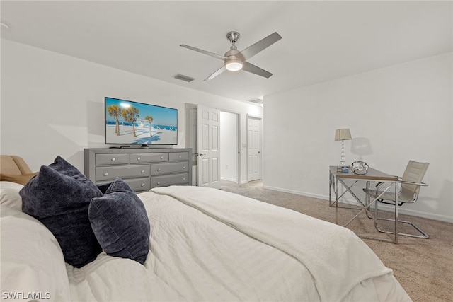 bedroom featuring light colored carpet and ceiling fan